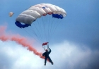 A Red Devils display team member died as a result of an unplanned parachute stunt