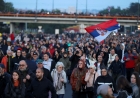 Serbian opposition figures and demonstrators stage a demonstration in Belgrade, alleging a fraudulent election