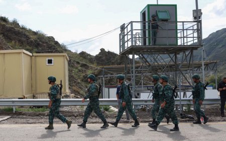 At the border, Azerbaijan and Armenia swap captives