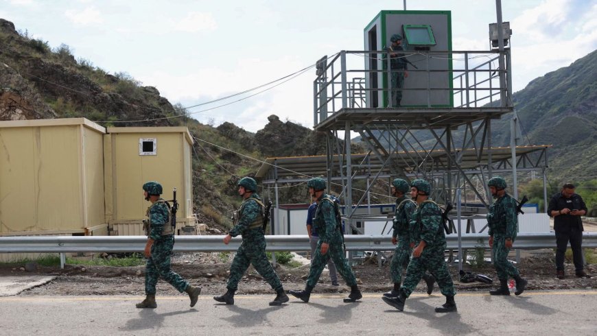 At the border, Azerbaijan and Armenia swap captives