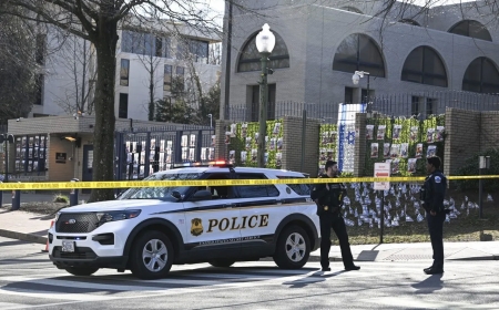 A US Air Force man burns to death outside the Israeli embassy